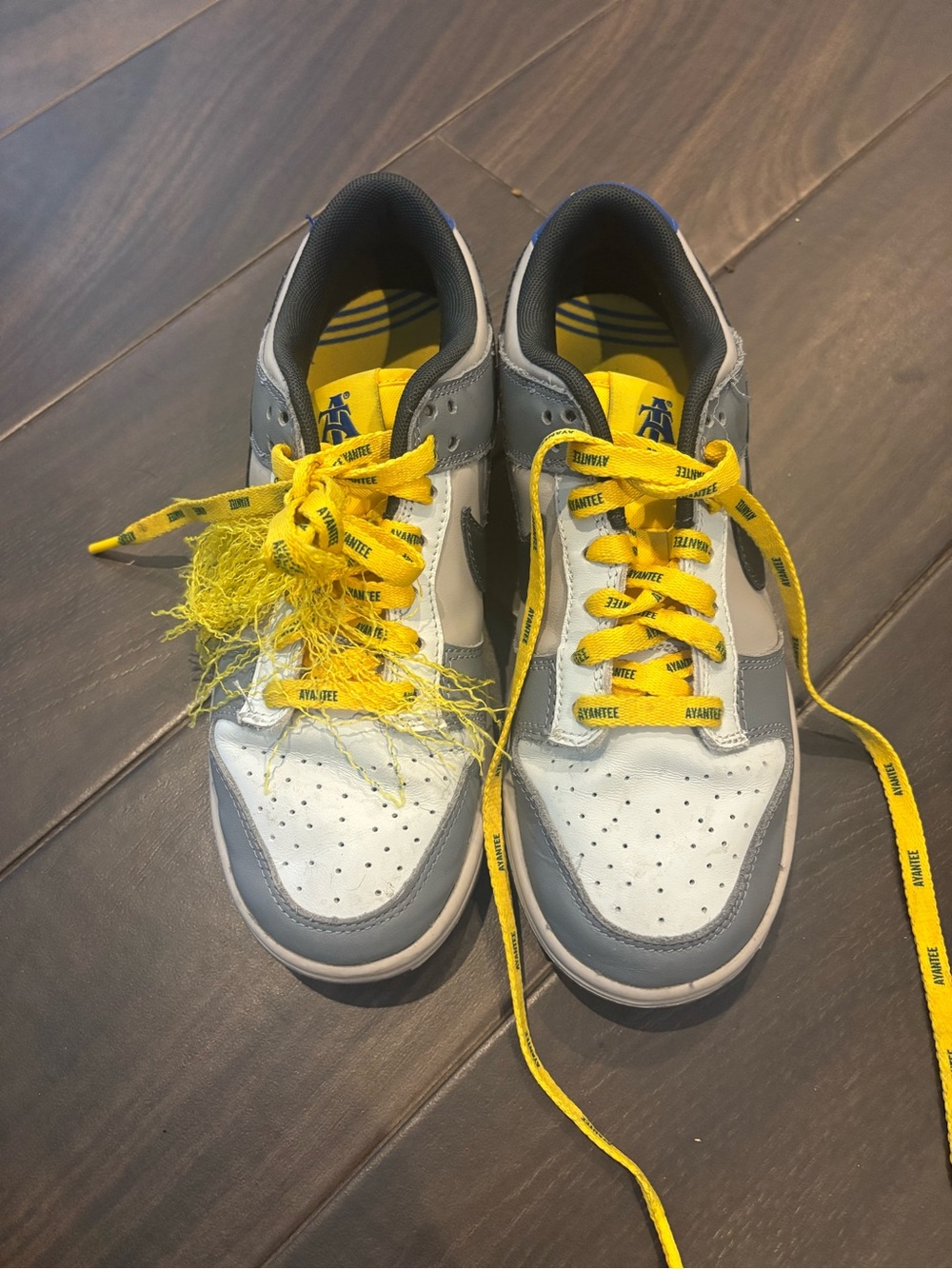 Nike North Carolina Gray and White Sneakers with Yellow Laces